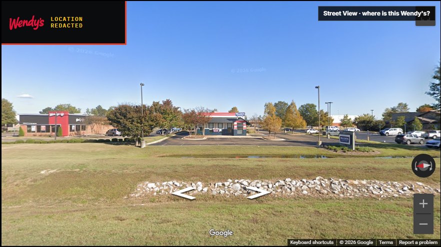 Street View outside a Wendy's with the location covered by a redacted badge