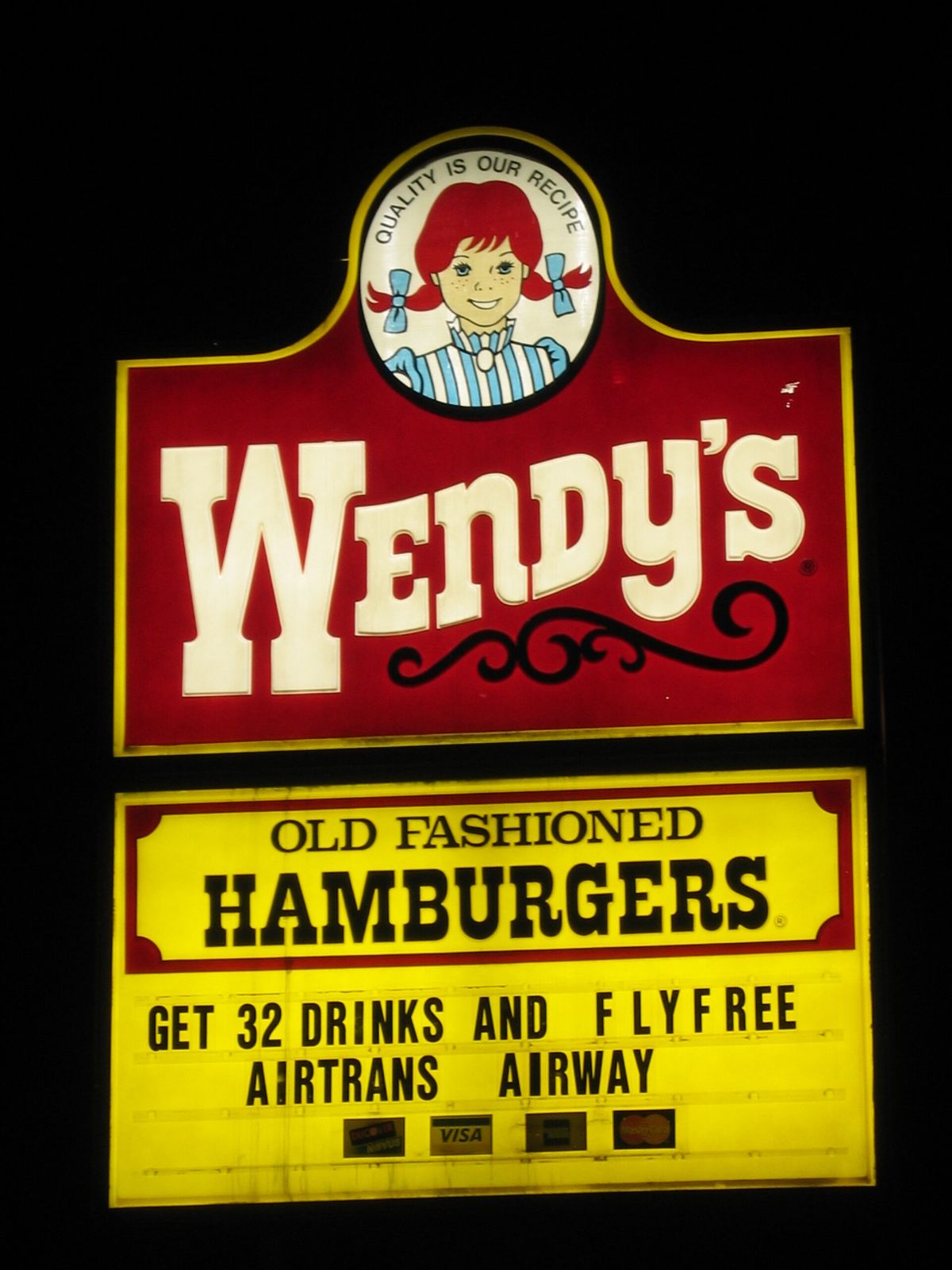 Wendy's sign with a promotion board